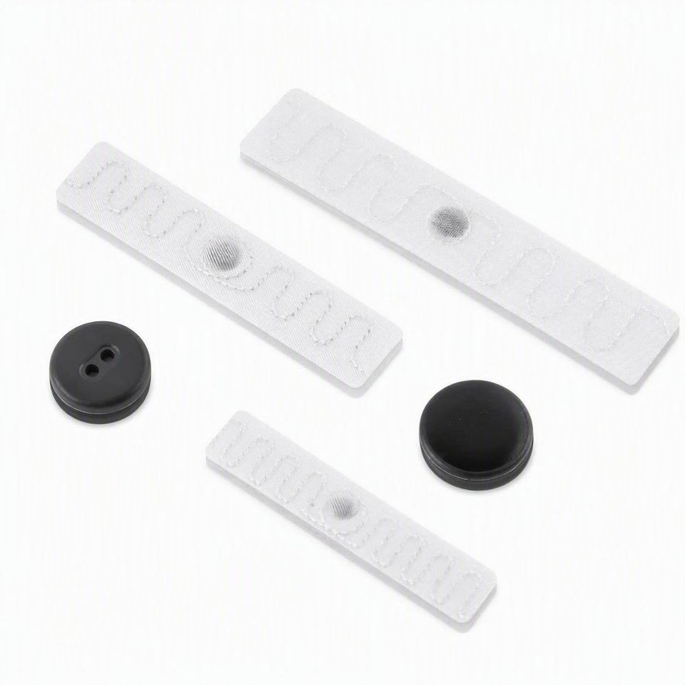 Heat-seal and sew-in RFID laundry tags